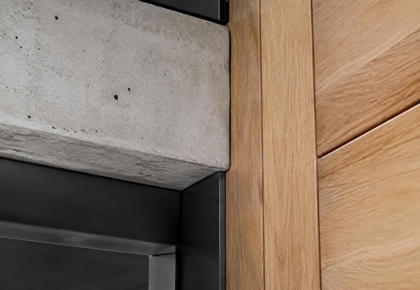 Architectural detail of concrete, oak and steel